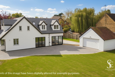 Side of property & Double Garage
