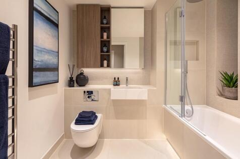 Light bathroom with bespoke cabinetry &amp; vanity