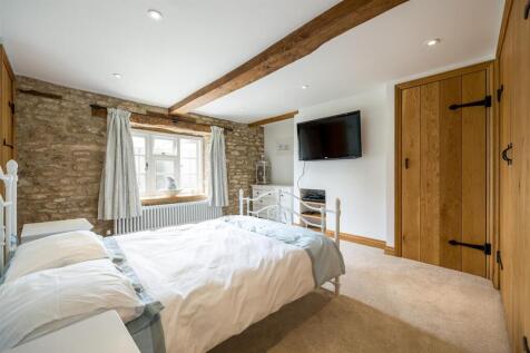 One of five charming bedrooms