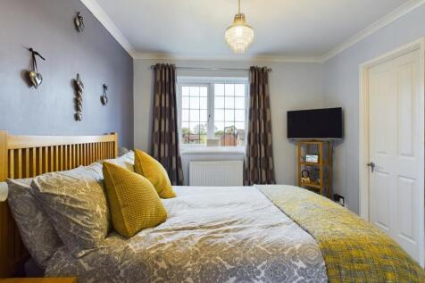 Master bedroom with dressing area and ensuite