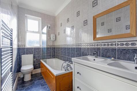 Fully Tiled Family Bathroom