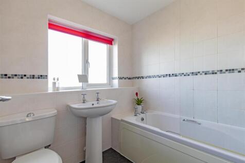 Fully Tiled Family Bathroom