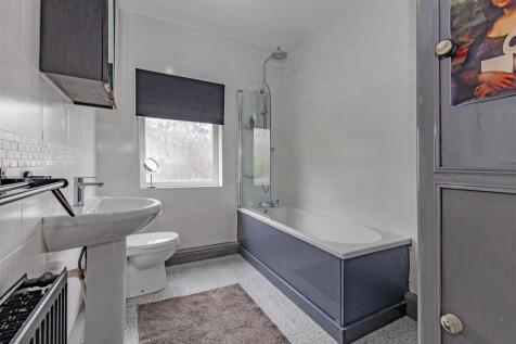 Fully Tiled Family Bathroom