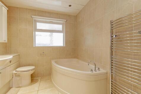 Fully Tiled Family Bathroom