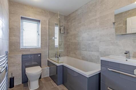 Fully Tiled Family Bathroom