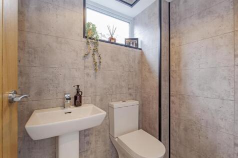 Fully Tiled Cloakroom/WC