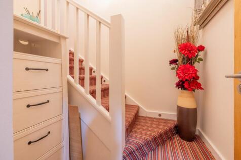 Stairs from the front apartment door to the landing