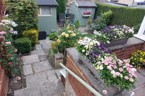Rear garden in bloom (photo supplied by the vendor)