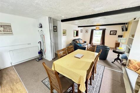 FRONT OPEN PLAN KITCHEN/ LIVING AND DINING AREA