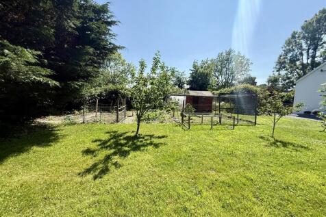 Enclosed poultry run and vegetable garden
