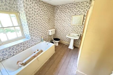 BATHROOM off through Bedroom