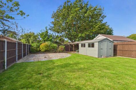 Rear garden/store &amp; bar area