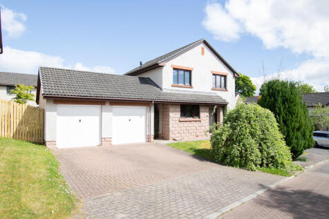 Front Elevation, Driveway And Garage