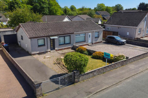 Front Elevation, Drive And Garage