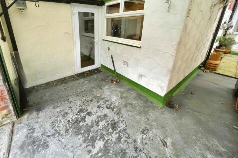 Rear Patio and Storage Area