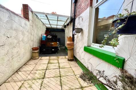 Rear Sitting Area with Car Port