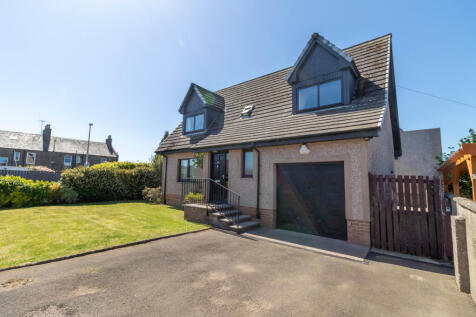Front Elevation, Driveway, Gardens And Garage