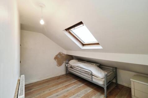 Large bedroom three with Velux window