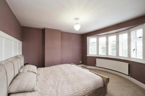 Generous Bedroom One with Bay Window and Shutters