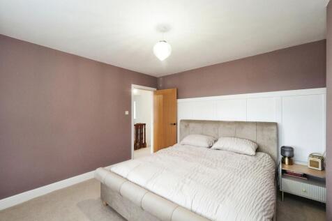 Generous Bedroom One with Bay Window and Shutters