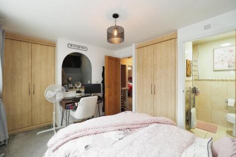 Large Double Bedroom One with Panel Wall and En Suite