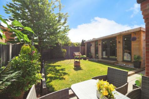 Fantastic Rear Garden with Patio and Log Cabin