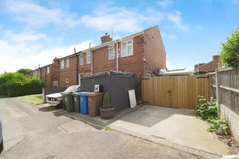 Great corner plot with space to front, side and rear!