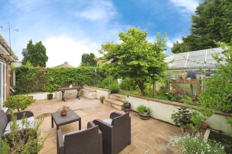 Rear Patio/Seating Space with Nature Pond