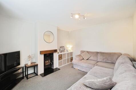 Modern Cosy Lounge with Log Burner