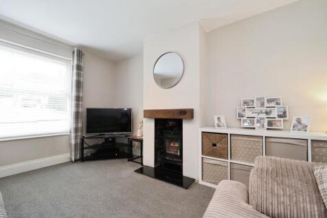 Modern Cosy Lounge with Log Burner
