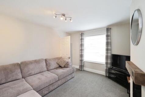 Modern Cosy Lounge with Log Burner