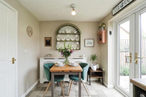 Bright Kitchen and Dining Space with Double Doors