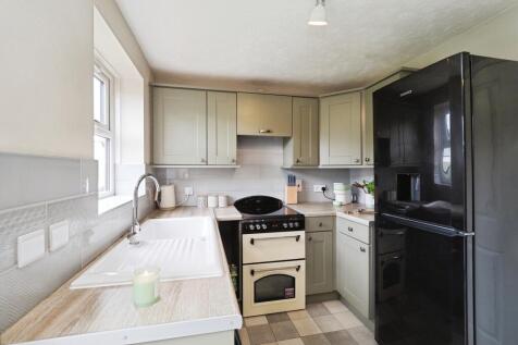 Bright Kitchen and Dining Space with Double Doors
