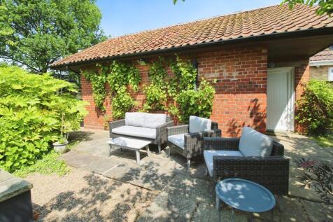 Patio and outbuildings