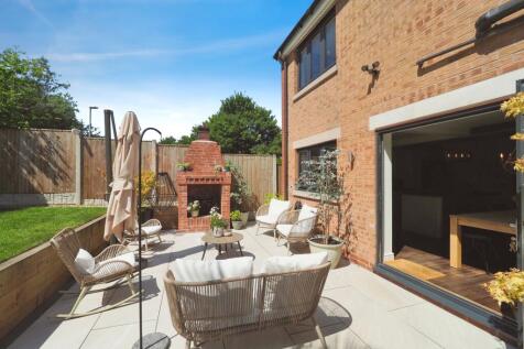 Garden with Feature Fire, multiple seating areas and wow