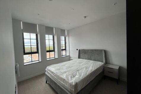 bedroom with furn...
