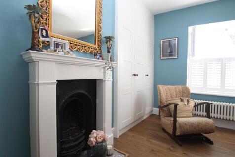 bedroom 1 fireplace.JPG