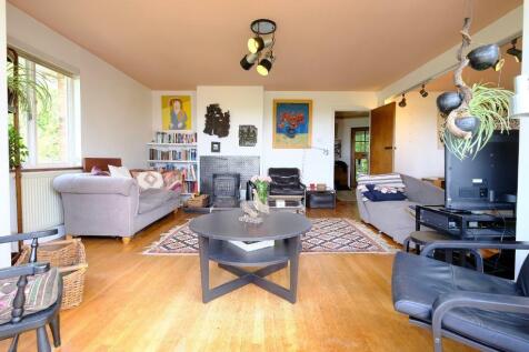 Sitting room with doors to sun deck