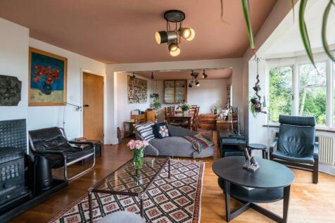 Sitting room and dining room with views