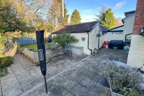 Rear courtyard, store &amp; office