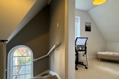Arched window on stair case