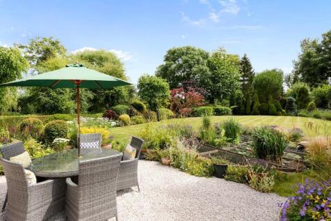 Terrace and colourful gardens