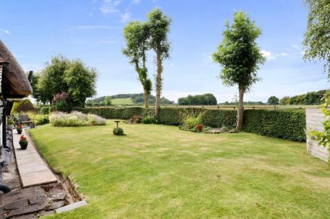 Rear garden and field views