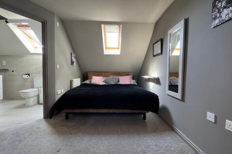 Bedroom 1 with modern en suite shower