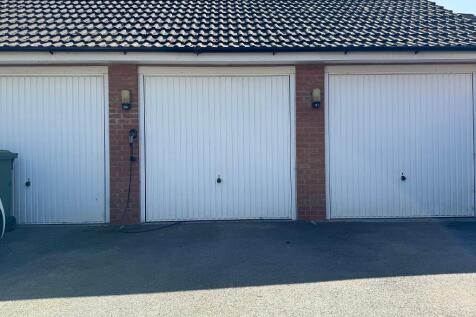 Middle garage accessed via garden