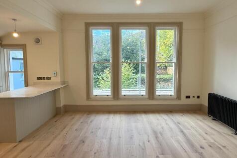Triple window with garden &amp; hill views