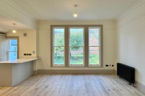 Triple window with garden &amp; hill views