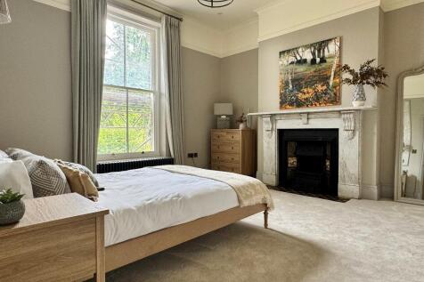 Bedroom 2 with original fireplace