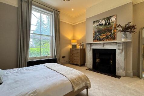 Bedroom 2 with original fireplace