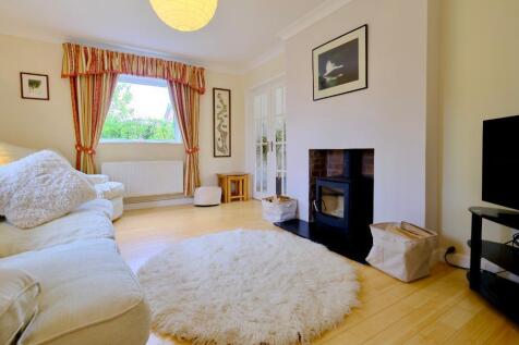 Comfortable sitting room with log burner
